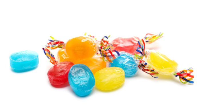 Colorful,Hard,Candies,In,Transparent,Cellophane,Wrapping,,Sweets,Pile,Isolated
